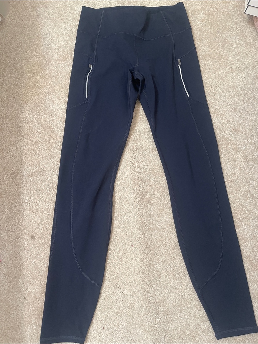 Athleta women’s high waist Blue leggings  with Zip Pockets